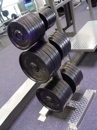 barbell plates in gym