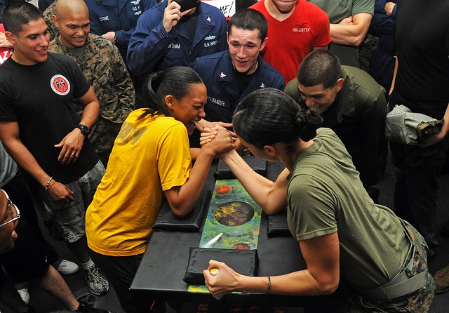 arm wrestling, competition, women, dialogue analogy