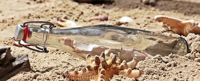 message in a bottle bottle post beach sand glass bottle letters mussels letter in bottle bottle beach beach beach beach beach