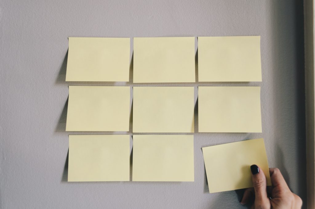 postits sticking to a board